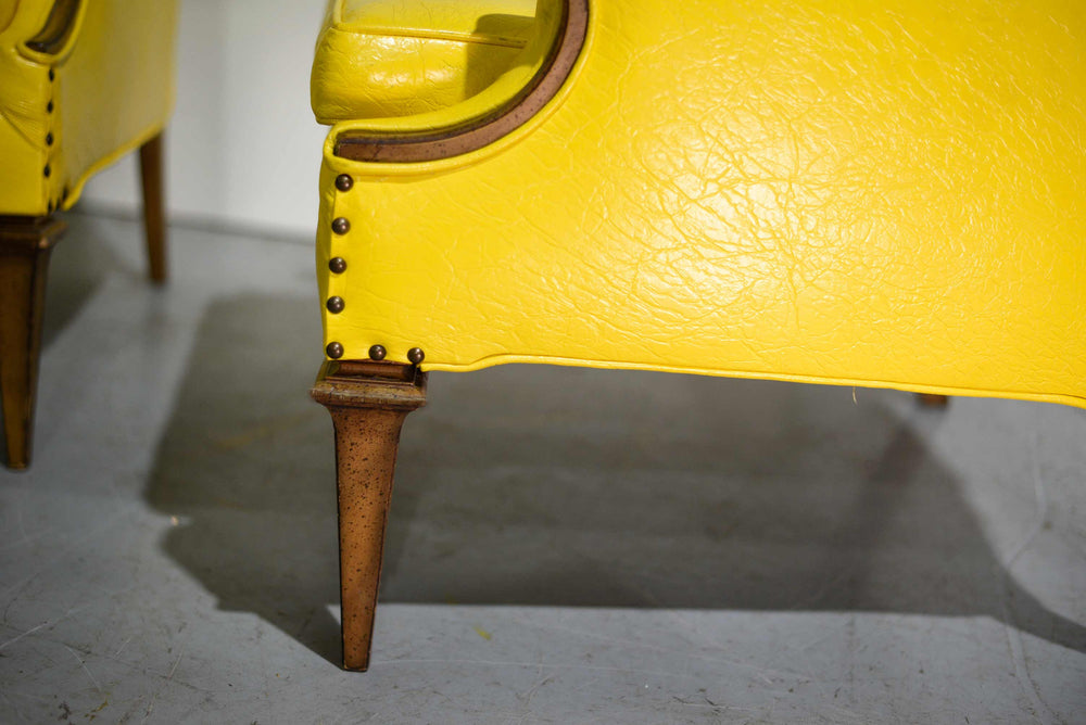 1960s Transitional Canary Yellow Vinyl Lounge Chairs - A Pair