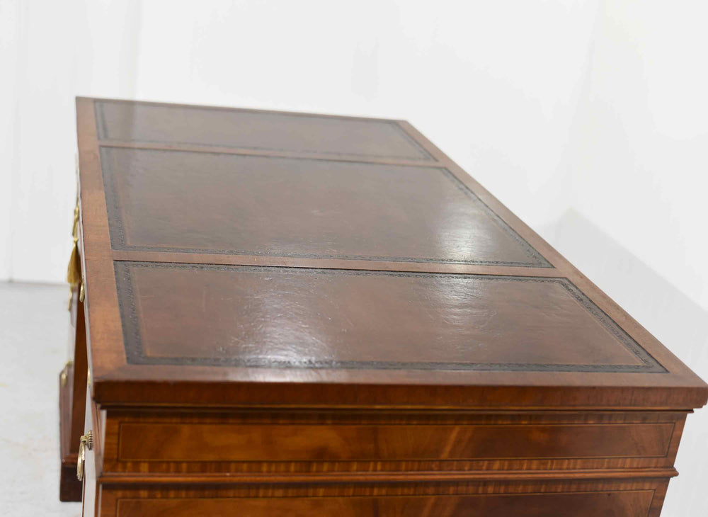 Mid Century Flame Mahogany Banded and Inlaid Leather Top Desk